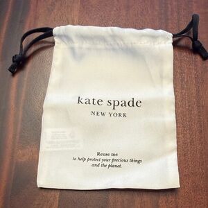 Kate Spade Ivory Drawstring Bag